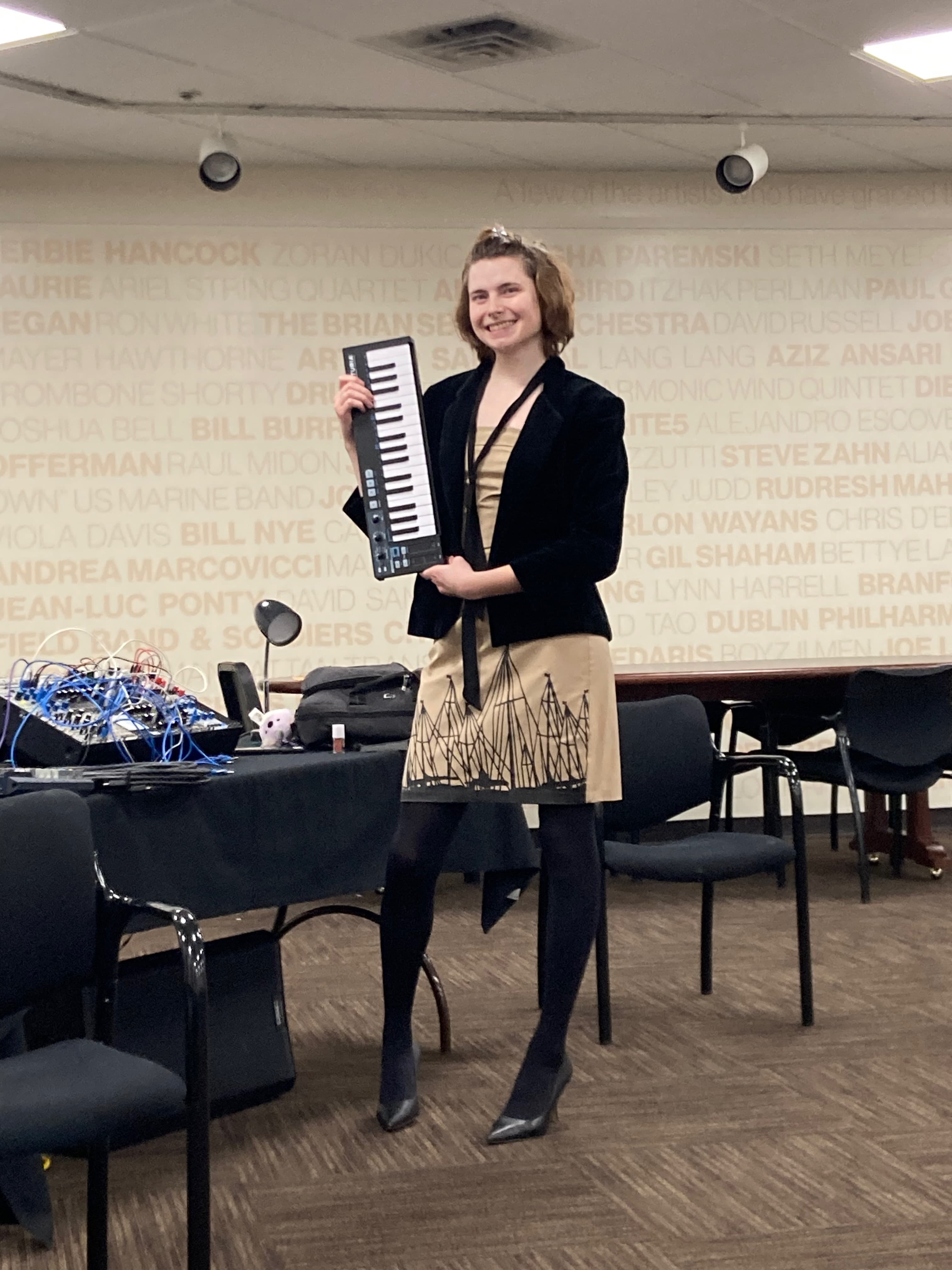 Addison teaching with keyboard